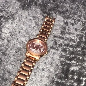 Michael Kor’s rose gold watch